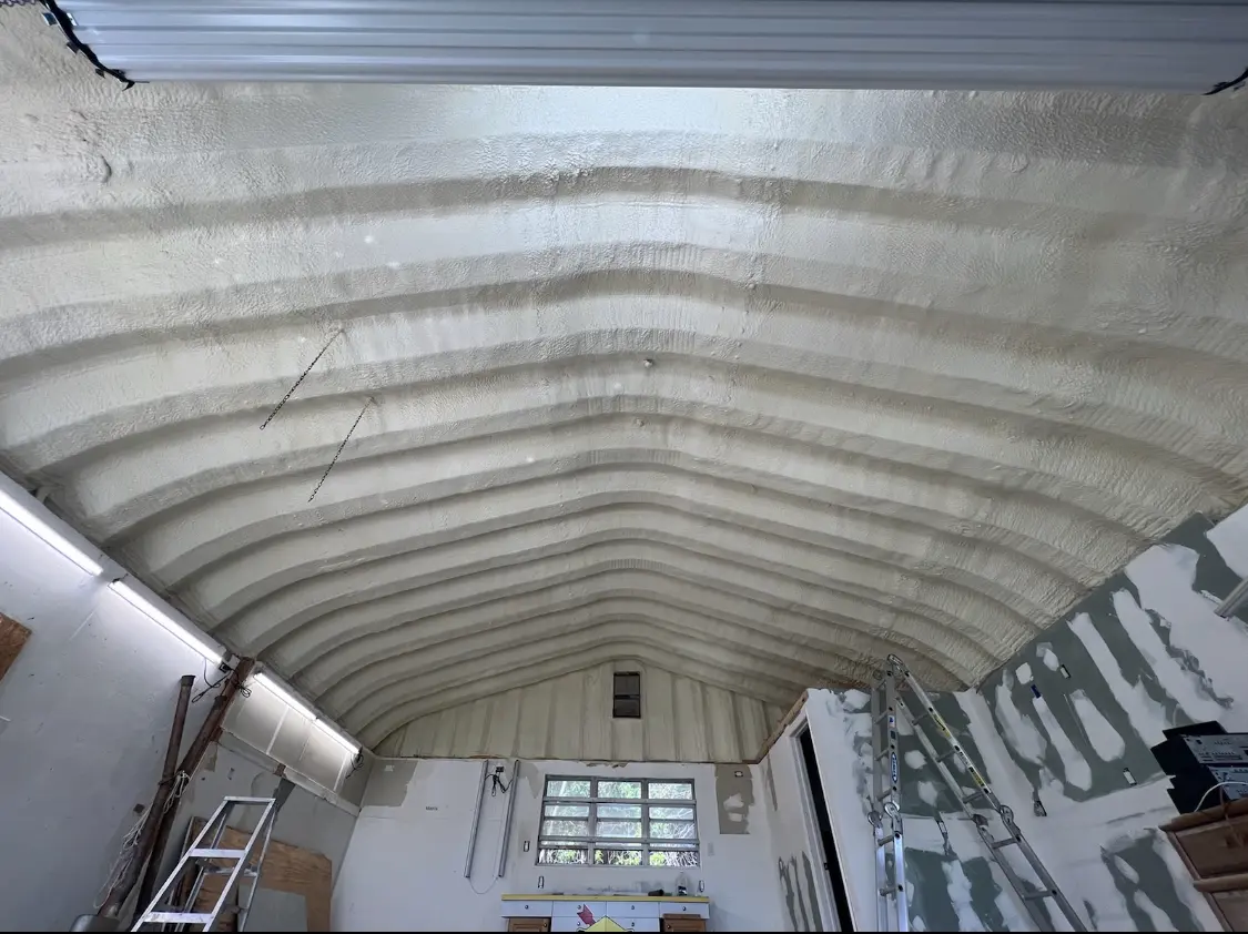 Spray polyurethane foam applied to the underside of a metal roof deck in El Dorado Hills